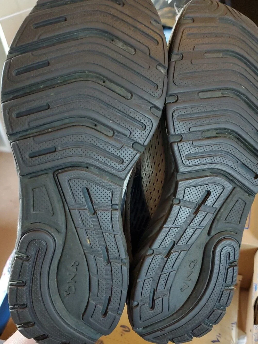 Brooks beige and white running shoes